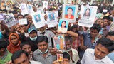 রানা প্লাজা দুর্ঘটনায় আক্রান্তদের মৃতদেহের সন্ধান চেয়ে ছবিসহ স্বজনদের অপেক্ষা।