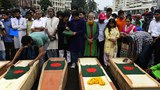 জঙ্গিদের হামলায় নিহত বাংলাদেশি মুক্তমনা লেখক ও প্রকাশকদের প্রতিকী কফিনে জাতীয় পতাকা মুড়িয়ে শ্রদ্ধা নিবেদন।