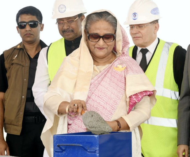 রূপপুর পারমাণবিক বিদ্যুৎ কেন্দ্রের প্রথম কংক্রিট ঢালাইয়ের শুভ সূচনা ও ফলক উন্মোচন করেন প্রধানমন্ত্রী শেখ হাসিনা। রূপপুর পারমাণবিক বিদ্যুৎ কেন্দ্রের প্রথম কংক্রিট ঢালাইয়ের শুভ সূচনা ও ফলক উন্মোচন করেন প্রধানমন্ত্রী শেখ হাসিনা।