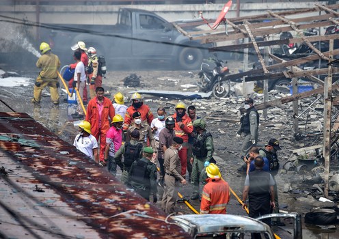 Police officials and rescue workers inspect damage after a truck bomb exploded outside a building housing police officers and their families in Muang, a district of southern Thailand’s Narathiwat province, Nov. 22, 2022. One person died and more than two dozen were injured in the attack, the provincial governor said.