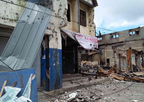 A photo released by the Crisis Management Team shows destruction in the rebel-held Bangolo district in downtown Marawi city, June 29, 2017. 