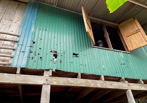 In this photo taken on May 7, 2021, bullet holes pock a house in Krong Pinang, a village in southern Thailand’s Yala province, where two insurgents spent the last hours of their lives before being killed during a standoff with government forces three days earlier.