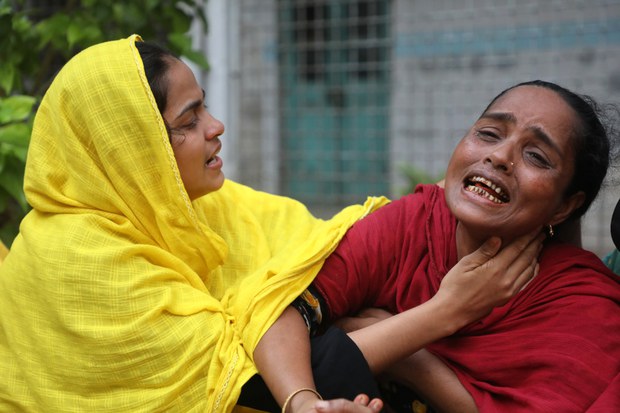 Relatives fight bureaucracy to claim bodies after Bangladesh clashes Relatives fight bureaucracy to claim bodies after Bangladesh clashes