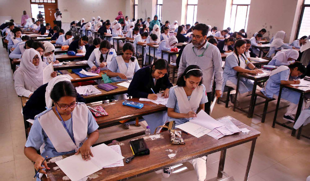 Bangladeshi students take their exams at a high school in Dhaka, Feb. 2, 2019. [BenarNews]