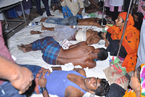 Demonstrators receive medical treatment in a hospital in the south-central Bangladesh city of Barisal after police said they opened fire in self-defense on demonstrators who were throwing rocks at officers, Oct. 20, 2019. 