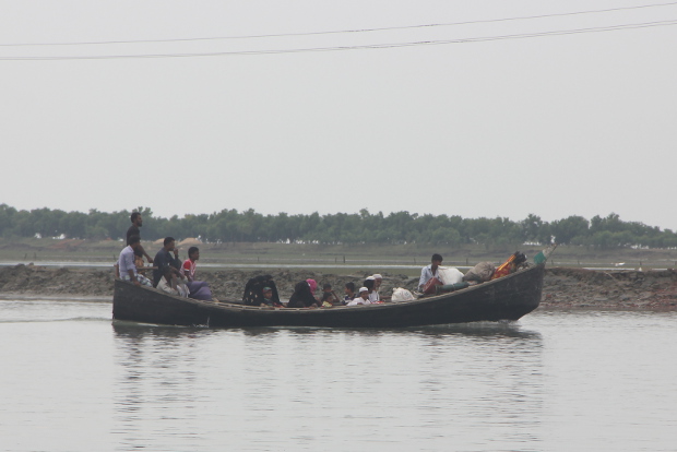 A boat ferries Rohingya refugees to Dakhin Para in Cox's Bazar, Bangladesh, Nov. 2, 2017.