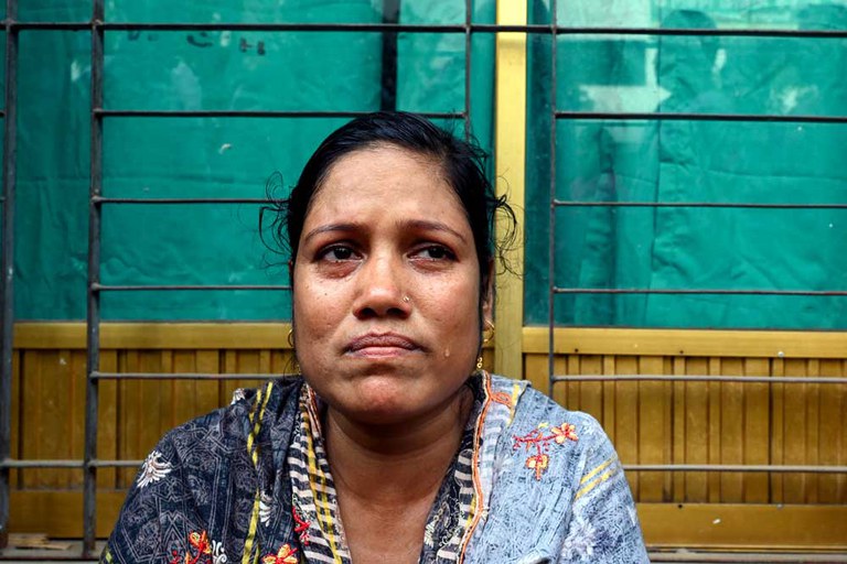 Shahida Begum, aunt of a college student who was killed during the clash between police and anti-quota protesters, mourns at Dhaka Medical College Hospital in Dhaka on July 20, 2024. [Munir Uz Zaman / AFP]