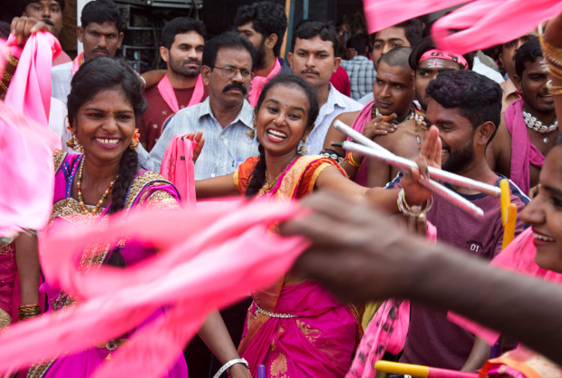 Supporters of Telangana Rasthtra Samathi (TRS) celebrate as trends indicate victory for the party in the Telangana State Assembly elections in Hyderabad, India, Tuesday, Dec. 11, 2018. [AP]