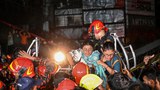 Officials: No fire exits, single stairway in Dhaka building where fire killed dozens