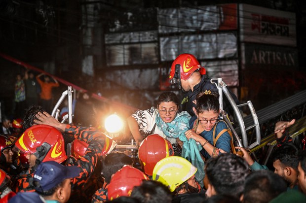 Officials: No fire exits, single stairway in Dhaka building where fire killed dozens Officials: No fire exits, single stairway in Dhaka building where fire killed dozens