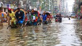 Heavy rain turns Dhaka's roads to rivers