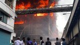 Bangladeshis seek missing relatives at site of huge factory fire