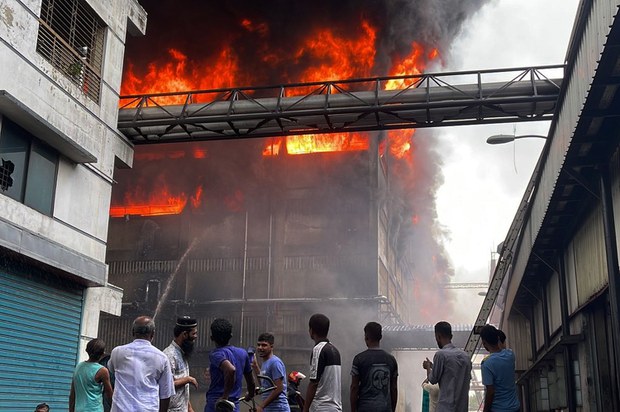 Bangladeshis seek missing relatives at site of huge factory fire