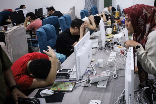 Indonesia deports 153 Chinese nationals accused of running online love scams Indonesia deports 153 Chinese nationals accused of running online love scams
