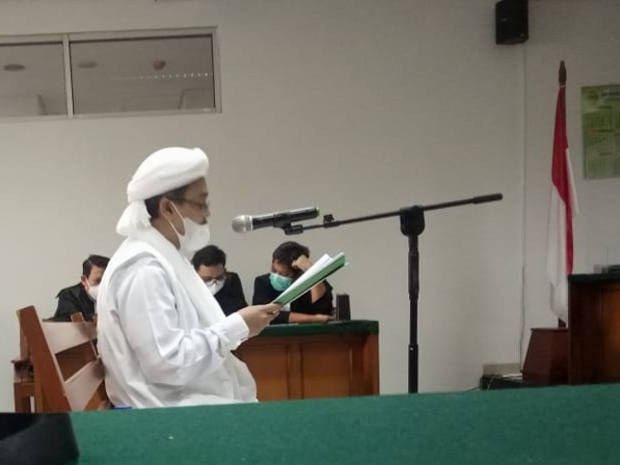 Firebrand Indonesian Cleric Claims Discrimination in COVID-19 Violation Trial Firebrand Indonesian Cleric Claims Discrimination in COVID-19 Violation Trial