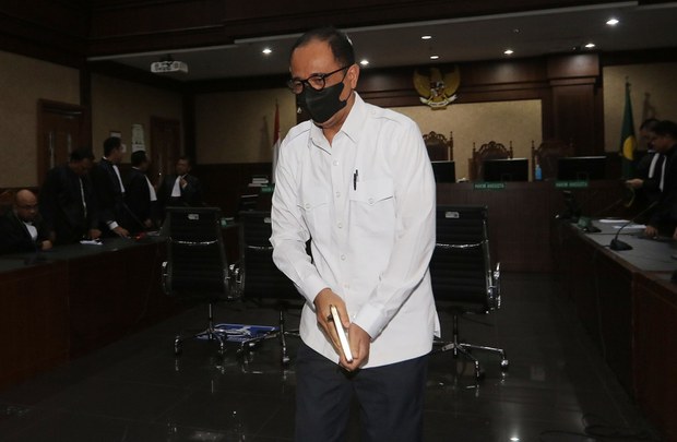 Ex-Indonesian tax official gets 14 years in prison for graft, money laundering Ex-Indonesian tax official gets 14 years in prison for graft, money laundering