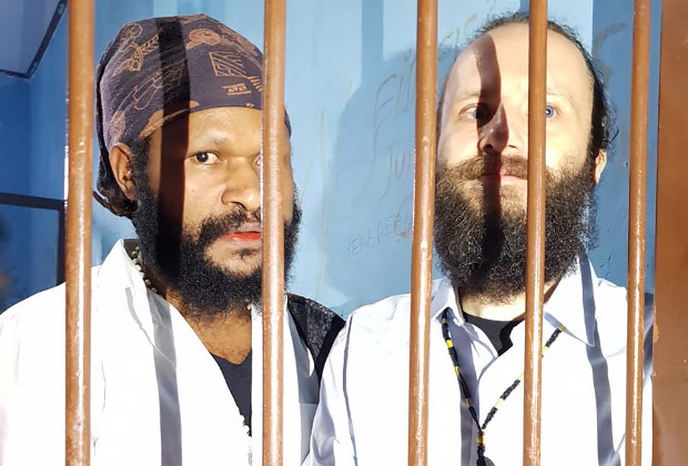 Jakub Fabian Skrzypski (right), and Simon Magal are seen in the holding cell at Wamena District Court in Jayawijaya, Papua, Jan. 14, 2019. (Courtesy of Latifah Anum Siregar)