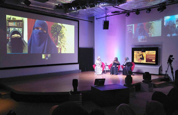 Indonesian and Malaysian women watch a giant screen in Jakarta as they take part in a Skype discussion with women from the United States and Britain to mark World Hijab Day, Feb. 1, 2018. (Nisita Kirana Pratiwi/BenarNews)