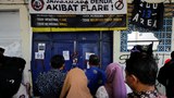 Indonesian police: Narrow stadium gates slowed people fleeing deadly football stampede