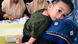 Video of mother feeding baby coffee mix piques Indonesian president on malnutrition