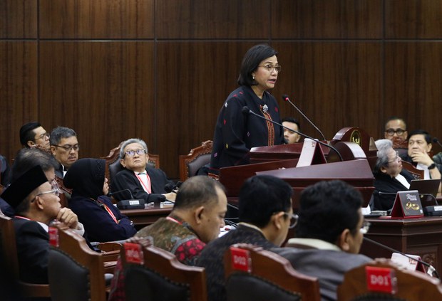 Indonesian ministers deny misusing social aid funds to influence presidential polls Indonesian ministers deny misusing social aid funds to influence presidential polls