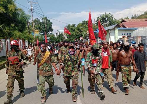 Papua rebels kill teacher, injure 6 accused of spying for Indonesian military