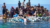 Dozens of Rohingya rescued from capsized boat off Indonesian coast