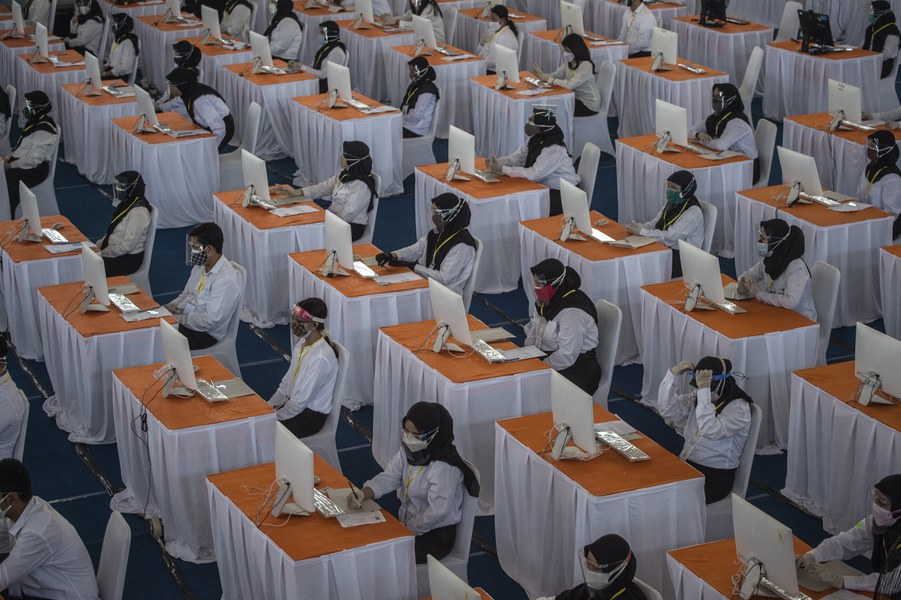 Young Indonesians take a test for civil servants in Surabaya, Sept. 20, 2021. In September 2024, local media reported that more than 3.5 million civil service aspirants took the test to fill a little over 250,000 positions.