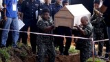 Malaysia to charge Thai nationals over mass graves found in 2015