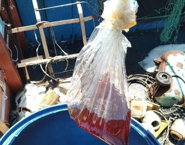 Investigators found a Molotov cocktail on one of the Vietnamese boats involved in a confrontation with the Malaysian coast guard in the South China Sea, Aug. 17, 2020. [Courtesy Malaysian Maritime Enforcement Agency]