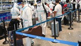 Malaysia tightens COVID screenings for tourists as China cases spike