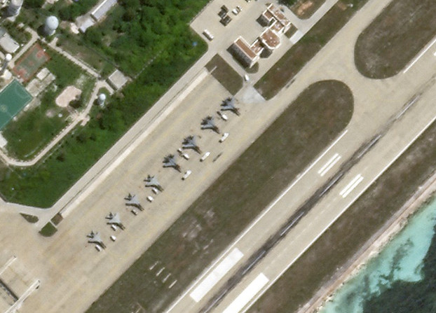 Eight fighter aircraft are visible on the Woody Island airstrip, China’s largest settlement in the Paracels in the South China Sea, July 17, 2020. [Planet Labs Inc.]