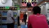 Malaysian PM calls snap polls 9 months ahead of schedule