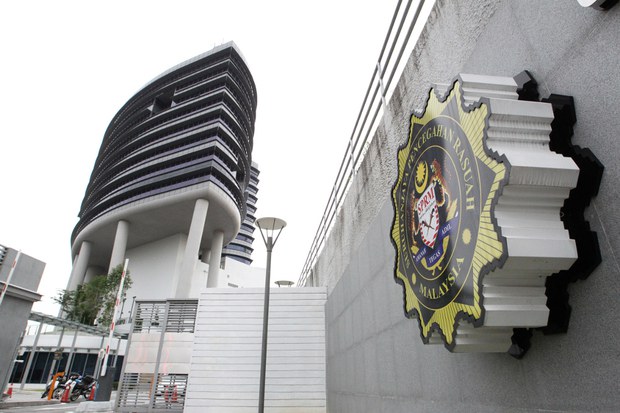 Malaysian Police Arrest 12 Law Enforcers Suspected of Links to Crime Ring
