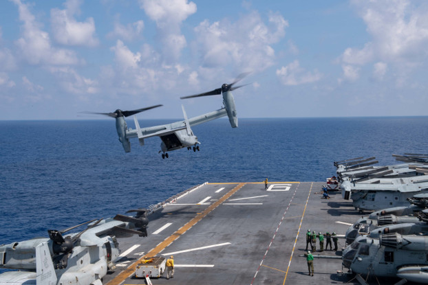 A U.S. MV-22B Osprey helicopter takes off from the USS America during operations in the South China Sea, April 19, 2020. [Petty Officer 3rd Class Jomark Almazan]
