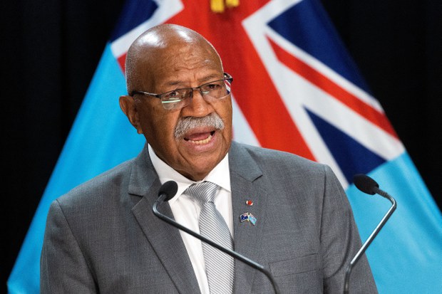Fiji prime minister shelves China visit after falling while looking at mobile phone Fiji prime minister shelves China visit after falling while looking at mobile phone