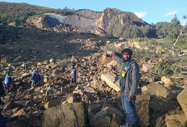Dozens feared dead after huge landslide in Papua New Guinea Dozens feared dead after huge landslide in Papua New Guinea