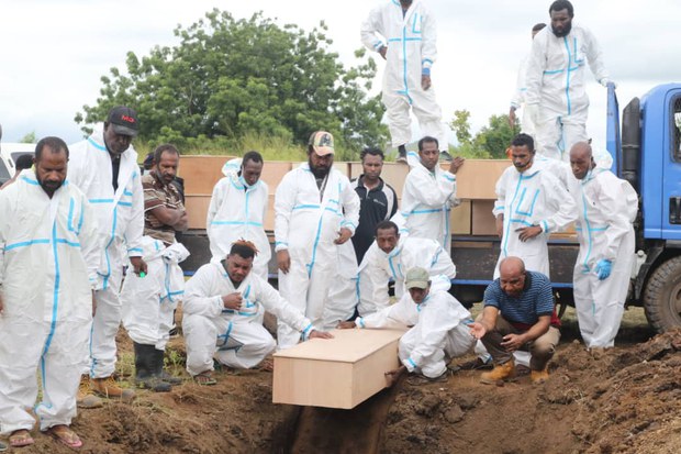 Papua New Guinea carries out mass burial to ease morgue overcrowding Papua New Guinea carries out mass burial to ease morgue overcrowding