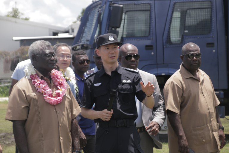 policemanandvan.JPG policemanandvan.JPG