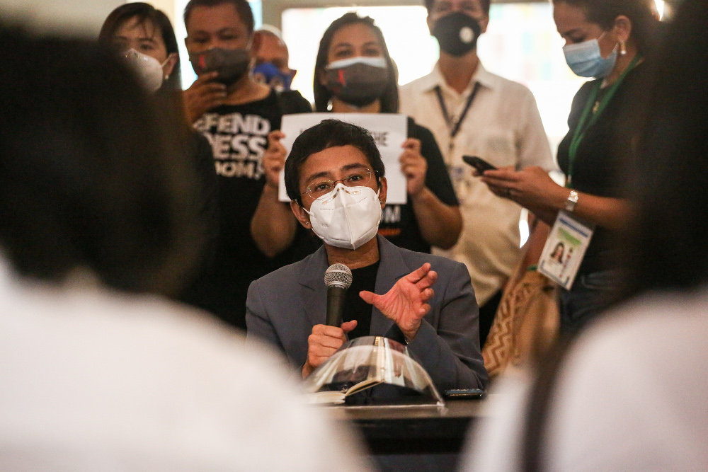 Rappler CEO and Executive Editor Maria Ressa addresses fellow journalists after she was convicted of cyber libel at the Manila Regional Court, June 15, 2020. [Basilio Sepe/BenarNews] 