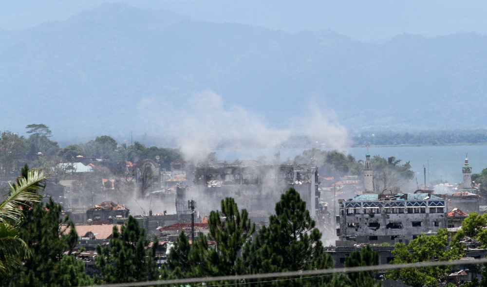 A section of the southern Philippine city of Marawi burns during a battle between government troops and Islamic State-lined militants, Aug. 30, 2017. (Photo: Jason Gutierrez/BenarNews)