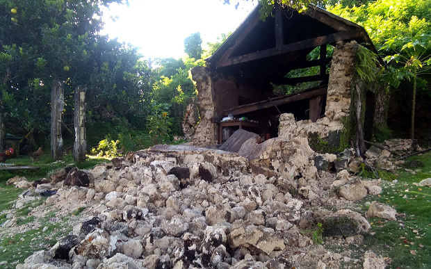 A home with walls made of stones and concrete collapsed after an earthquake with strong aftershocks hit the Philippines’ northernmost province of Batanes, July 27, 2019. 