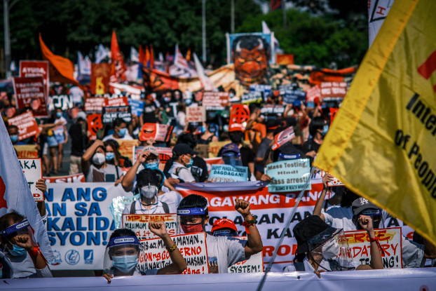 Protesters rally at the University of the Philippines in Manila to denounce policies by President Rodrigo Duterte, July 27, 2020. [Luis Liwanag/BenarNews]