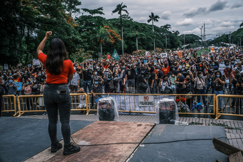 An activist addresses a rally against anti-terror legislation in Manila, June 12, 2020. [Luis Liwanag/BenarNews]