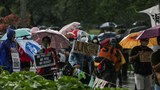 200612-PH-protesttors-rain-1000.jpg
