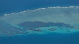 Beijing, Manila trade blame over coral damage at disputed shoal