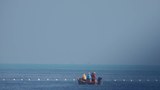 Philippine Coast Guard says it removed China-placed ‘floating barrier’ at disputed reef