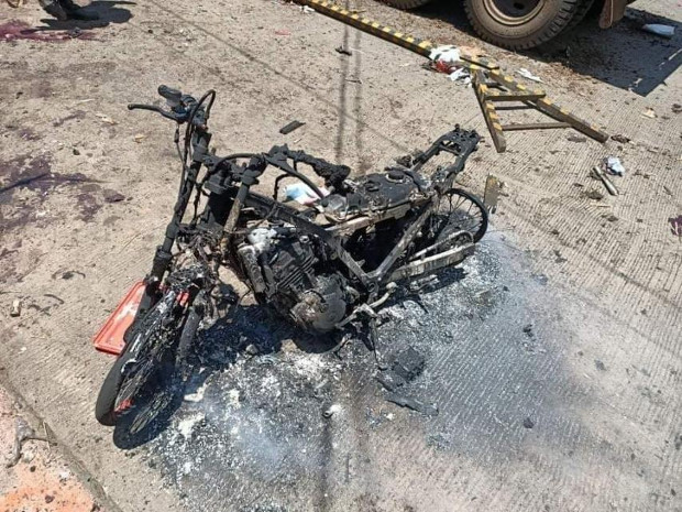 This motorcycle was used in Monday’s twin bomb attack in Jolo, southern Philippines, Aug. 24, 2020. [Handout photo from Armed Forces of the Philippines]