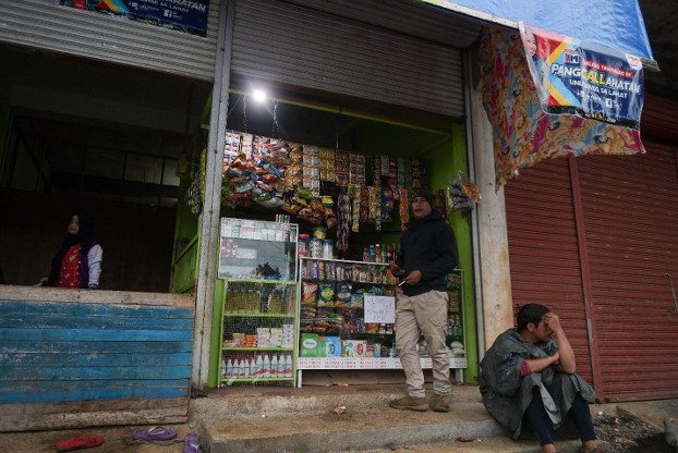 A store owned by an internally displaced person is lit by solar power in Tolali village in Marawi, Philippines, July 16, 2020. 