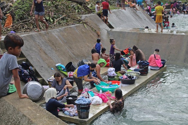 Death Toll from Philippine Typhoon Rises Sharply as Rescuers Reach Devastated Areas Death Toll from Philippine Typhoon Rises Sharply as Rescuers Reach Devastated Areas